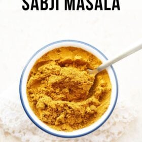Bowl of homemade sabji masala with text layovers.