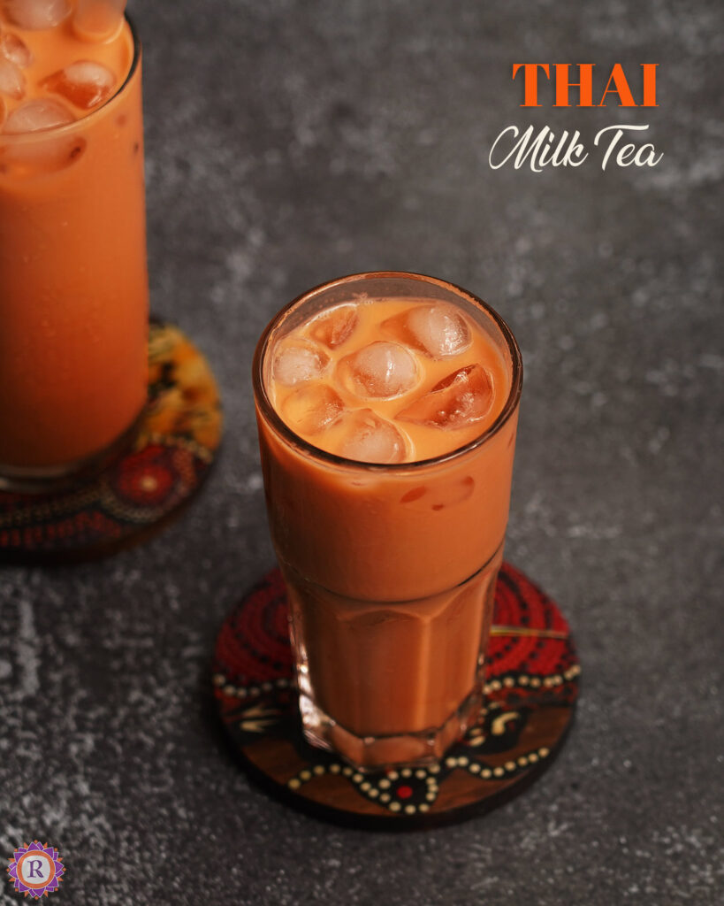 Glass of homemade Thai Milk Tea with ice cubes