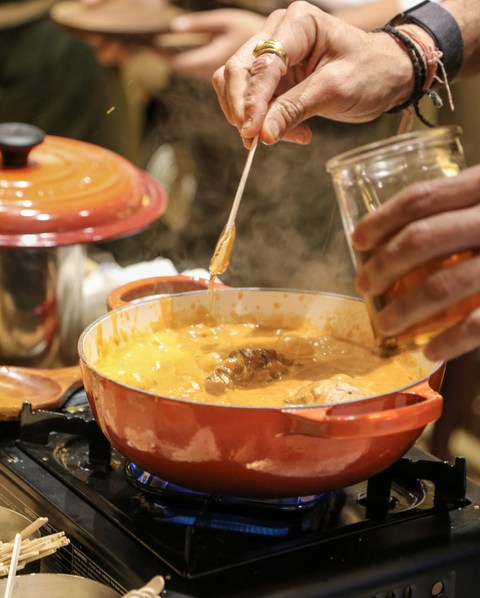The “butter chicken experience” at Adda is prepared tableside