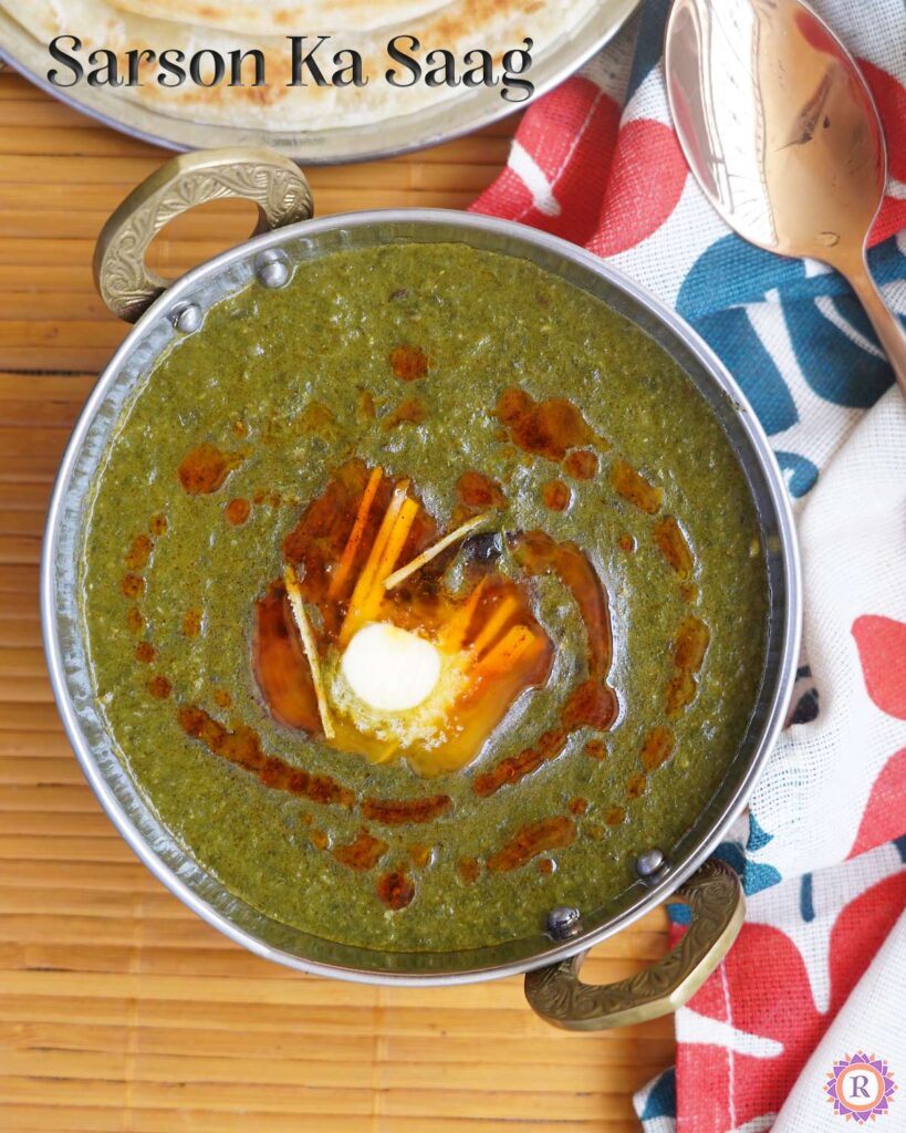 Sarson ka saag, topped with tadka, ginger julienne